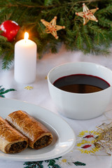 Polish Christmas red borscht with mushroom and cabbage pastries