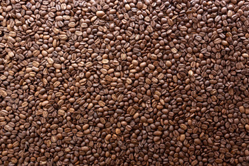 Coffee beans on the table background blurred abstract blurred