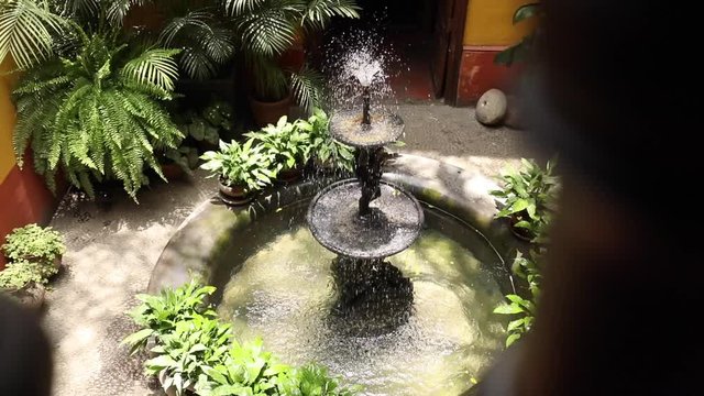 slowmotion of a fountain in the courtyard