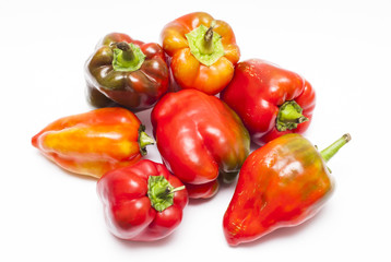 Ripe peppers closeup on white background