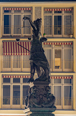 lady justice in Frankfurt at night