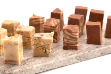 Six Different Flavors of Fudge on a White Background