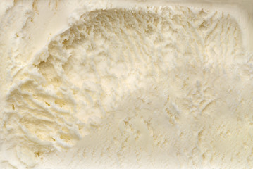Spooned vanilla ice cream background  