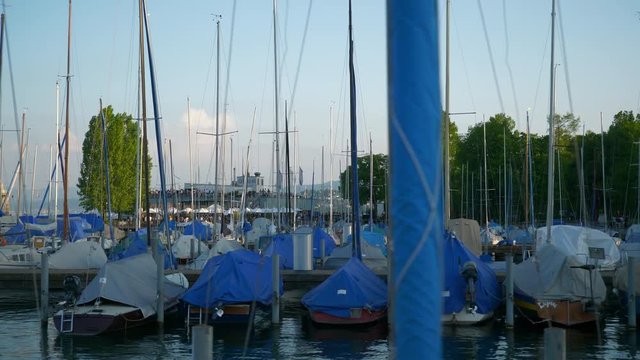 sunny evening zurich city lake yacht dock slow motion panorama 4k switzerland
