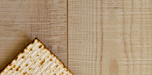 Jewish Matzot on grey wooden background with copy-space.Flat Lay