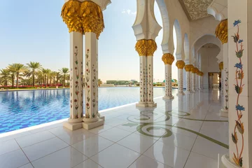 Fotobehang Sheikh Zayed Mosque - Abu Dhabi, United Arab Emirates. Beautiful white Grand Mosque exterior © DanRentea