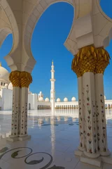 Fotobehang Sheikh Zayed Mosque - Abu Dhabi, United Arab Emirates. Beautiful white Grand Mosque minaret © DanRentea