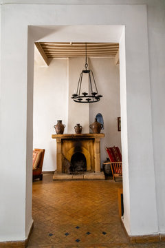 Fireplace and hanging light fixture