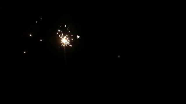 Squib sparkles 1080p definition slow motion footage on a black background.