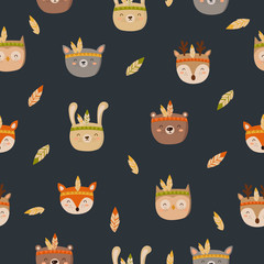 Seamless pattern with tribal animals on a dark background. Doodle illustration. Thanksgiving day, autumn holiday, baby shower