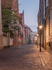 Krakow old town, Poland, Jagiellonksa street illuminated in the night