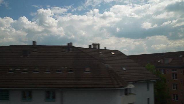 day time zurich train road trip side window pov panorama 4k switzerland
