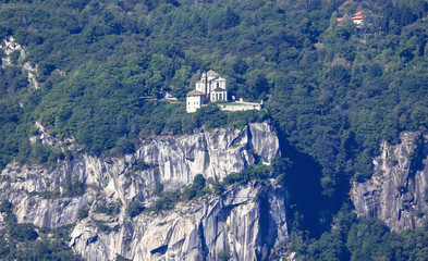 Fototapeta na wymiar Sanctuary built on a granite spur overlooking the Orta lake, surrounded by chestnut woods, Italy