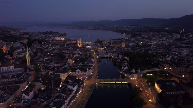 night illuminated zurich center famous central district riverside aerial panorama 4k switzerland  
