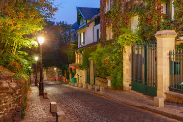 Cozy empty street on Montmartre hill in the morning, Paris, France