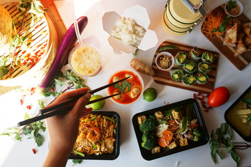Thai food take out, chopstick, table with meal
