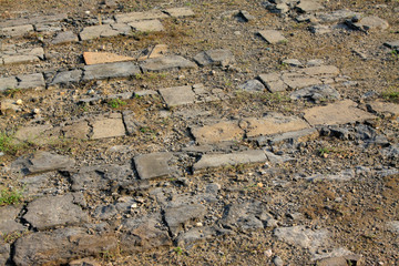 Broken brick on the ground