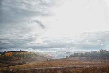 View of the surrounding hills and meadows in autumn.
