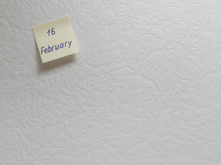 February 16, calendar date sticky note