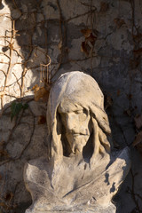 Historic Statue on the mystery old Prague Cemetery, Czech Republic