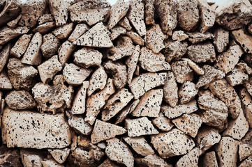 exture of a stone wall. Old castle background or texture.  Old castle stone wall texture background. Stone wall as a background or texture.  A typical wall of Menorca island, for background or texture