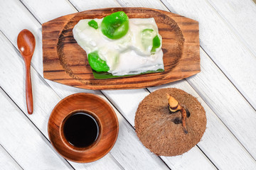 Badak berendam a local Malaysian dessert and cuf of coffee  on wooden background