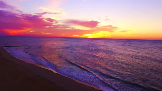 Hovering over Belmar Beach during a sunrise.  Beautiful ocean waves