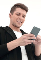 handsome guy reading SMS on smartphone