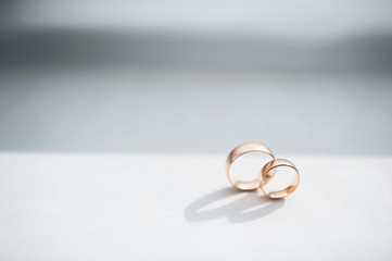 Close-up of wedding rings isolated on white background