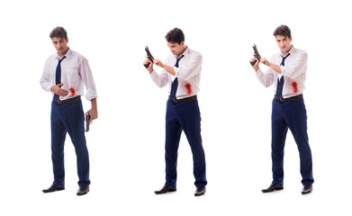 Obraz premium Businessman wounded in gun fight isolated on white