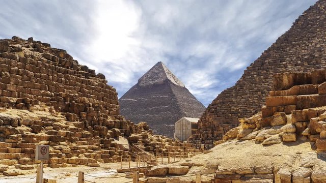 Time lapse with clouds over great pyramids at Giza Cairo in Egypt - Zoom In of Stone Pyramid