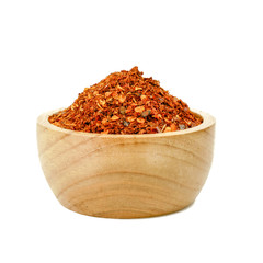 Pile crushed red pepper, Cayenne pepper, dried chili flakes isolated on white background