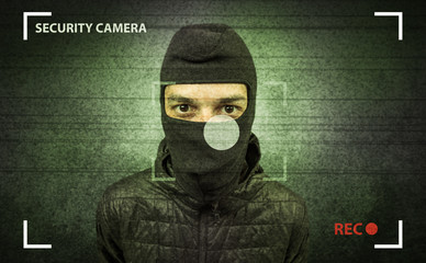 Caught burglar by house camera in action.