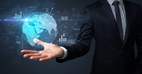 Businessman handing transparent global information flow concept on his hand