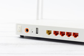 Wireless modem router network hub on wooden table