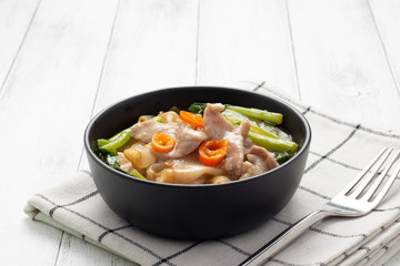Fried noodle with pork and Chinese broccoli
