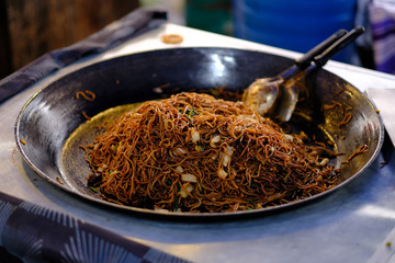 Asian, Indian and Chinese street food. Food court on local market of Langkawi island, Malaysia..Traditional asian street food.