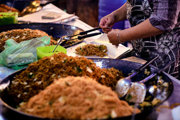 Asian, Indian and Chinese street food. Food court on local market of Langkawi island, Malaysia..Traditional asian street food.