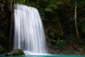 Fototapeta na wymiar Beautiful waterfall - Erawan waterfall at Erawan National Park in Kanchanaburi, Thailand.