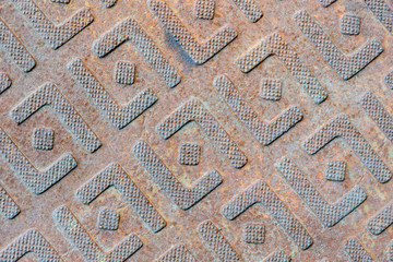 Steel sheet with pattern notches - gray vintage metal abstract light coloured background, texture close-up