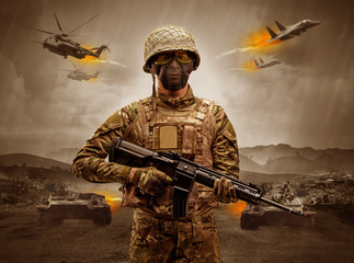 Armed soldier with sniper in the middle of a war

