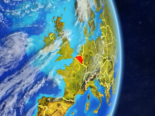 Belgium on planet planet Earth with country borders. Extremely detailed planet surface and clouds.