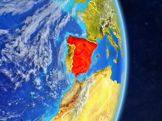 Spain on planet planet Earth with country borders. Extremely detailed planet surface and clouds.