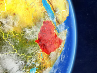 Ethiopia on planet planet Earth with country borders. Extremely detailed planet surface and clouds.