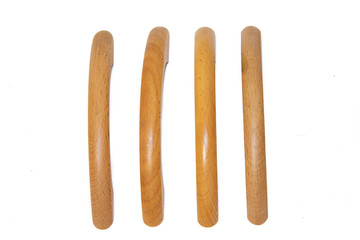 wooden handles for cabinets and drawers on a white background.