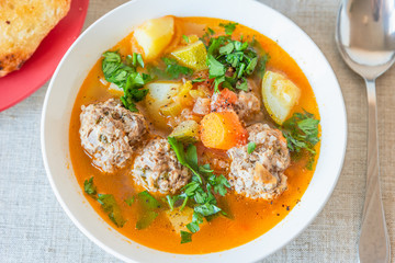 Spanish soup with meatballs and vegetables - Albondigas
