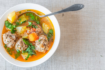 Mexican soup with meatballs and vegetables - Albondigas, copy space for recipe
