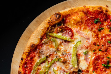 pizza on the black background