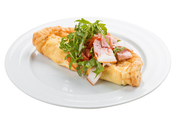 Frittata with bacon and tomatoes on a white background