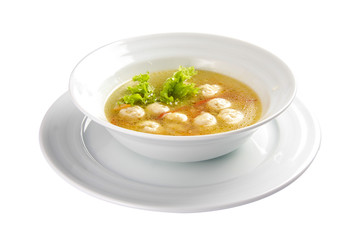 Soup "Shetbulo". Light soup with meat and vegetable fricadals. A traditional Swiss dish. On a white background